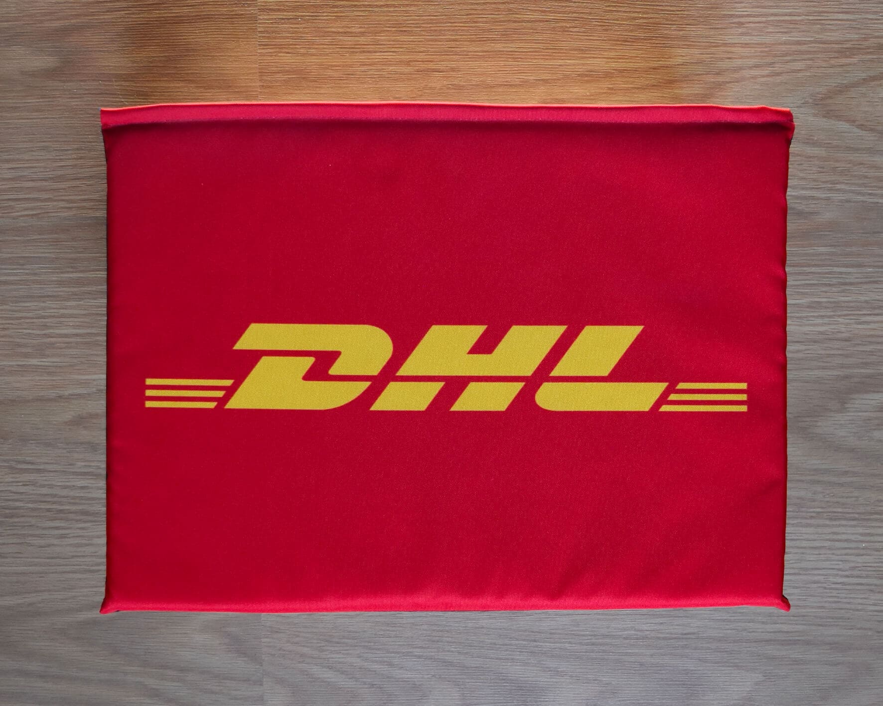 Sitzkissen bedruckt mit DHL Logo | Astron Ideas